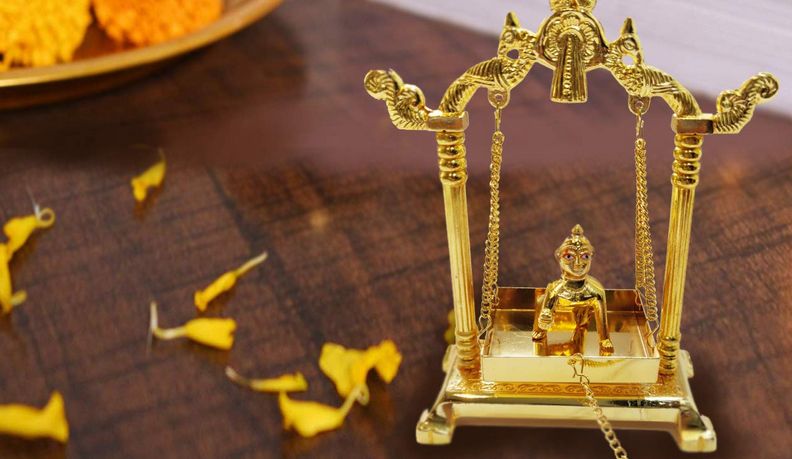 Lord Krishna on a swing
